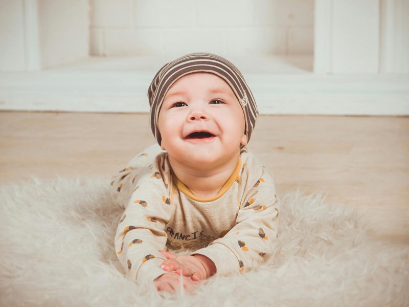 Baby smiling - Newborn Photo Retouching Services