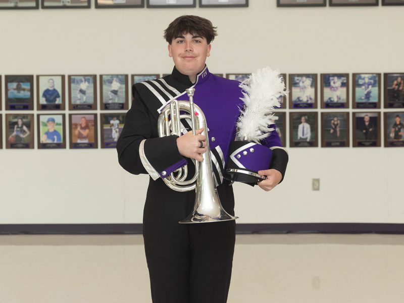 High School Boy with musical instrument - School Photo Editing Service - Before image by Smart Clipping (smartclipping.io)