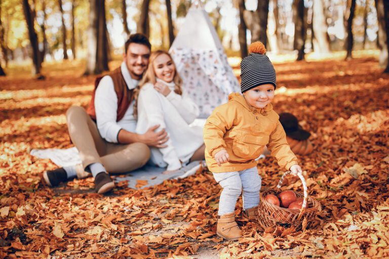 Beautiful and stylish family in a park