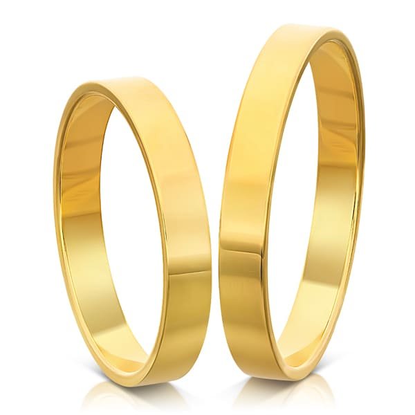 Two polished plain gold wedding bands on a white background.