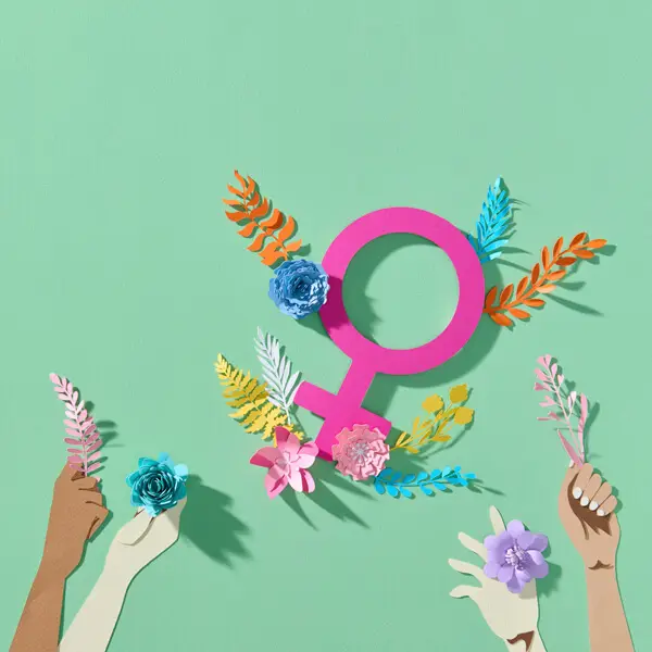 pink female gender symbol paper flowers