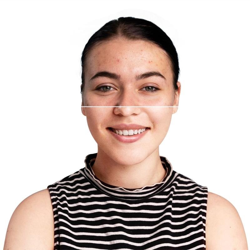 Smiling woman with dark hair in a black and white striped sleeveless top against white background.